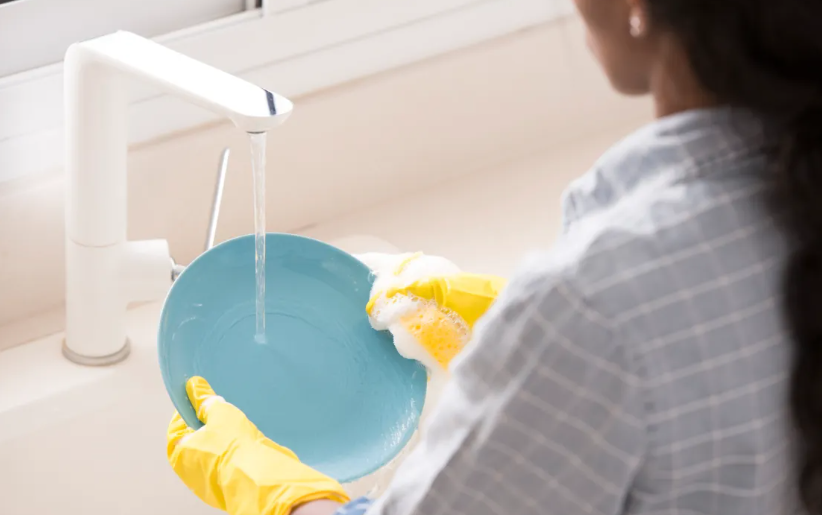 Someone washing dishes